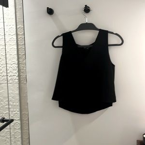 Black sleeveless flowy cropped top